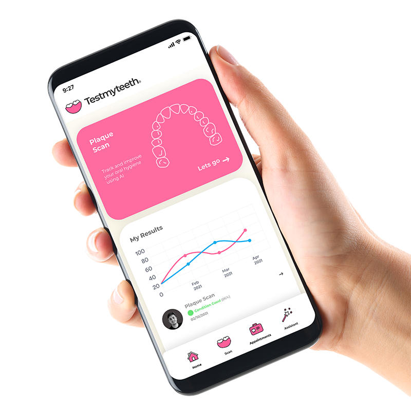 Testmyteeth Mobile Application to improve your dental health at home, an image of a phone using Testmyteeth dental app with a button on the screen to complete a plaque scan
